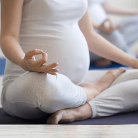 Pregnant Women Doing Yoga